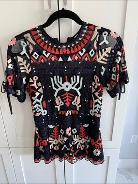 Parker Navy Embroidered Peplum Top with Multicolor Motifs